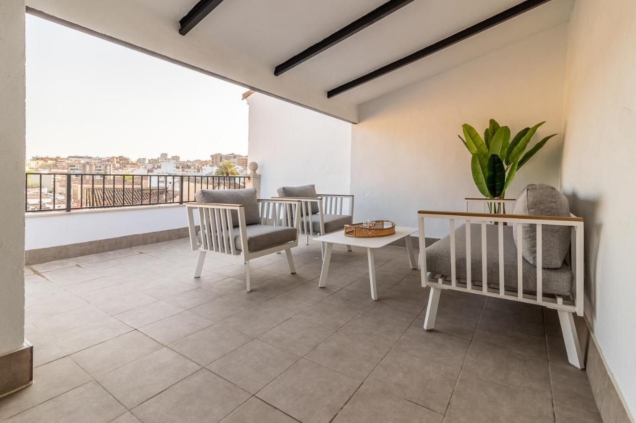Apartamentos El Patio Plaza Santa Clara Caces Extérieur photo
